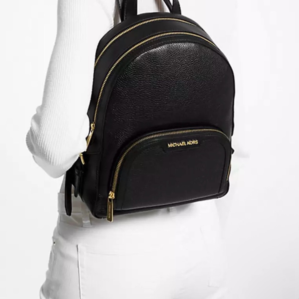 Michael Kors Elegant Black Backpack with Gold Accents